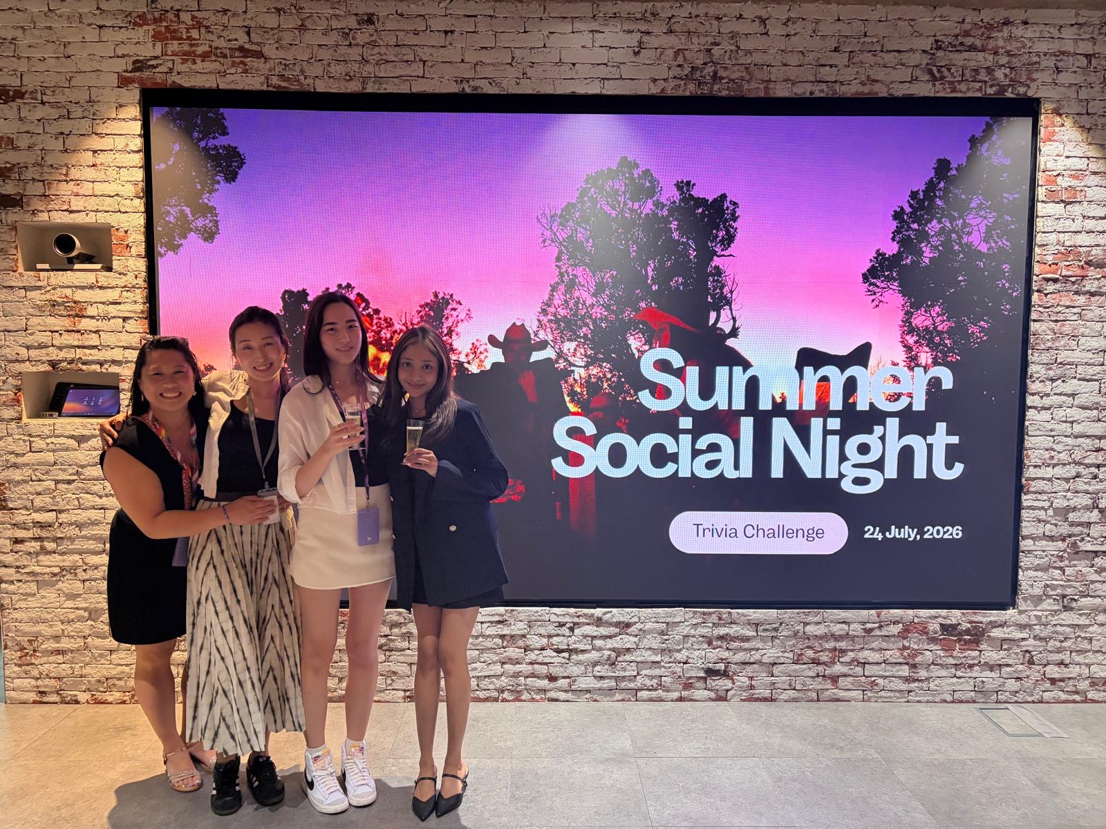 Organisers in front of the Summer Social Night screen